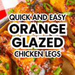 Orange Glazed Chicken legs baked to perfection, garnished with green onions and served on a tray. This roasted chicken legs dish is a flavorful chicken recipe perfect for any occasion. Text overlay included.