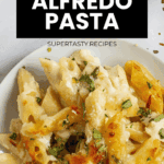 Plate of Chicken Alfredo Pasta baked to perfection and garnished with herbs, displayed under a recipe title on a white background.
