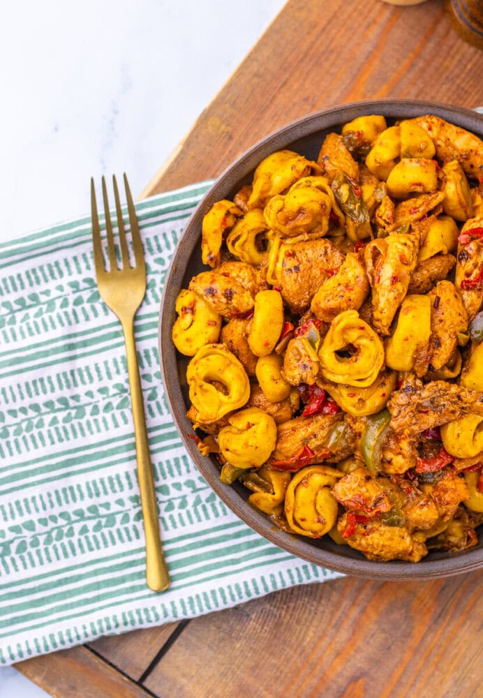 Southwest Ranch Chicken Tortellini with tortellini pasta and peppers in a serving bowl