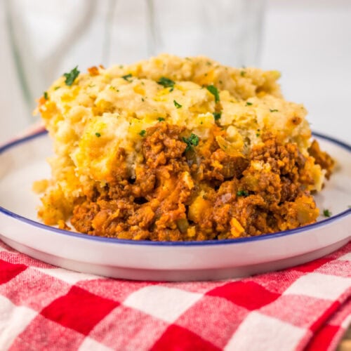 Slow Cooker Cheddar Bay Sloppy Joe Bake with mashed potato topping garnished with parsley