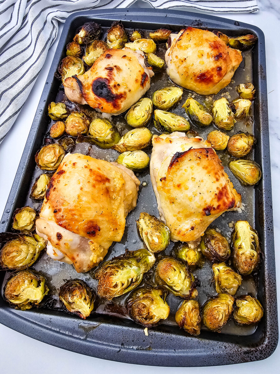 Honey mustard sheet pan chicken thighs with roasted Brussels sprouts, golden and caramelized