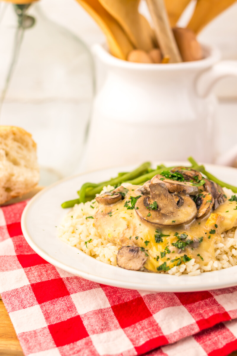 Slow cooker chicken and rice with mushrooms and green beans plated and ready to serve